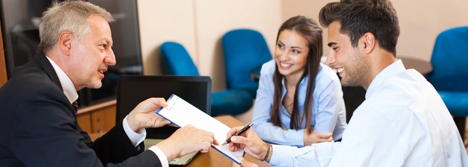 Senior-level executive receiving career coaching during outplacement process